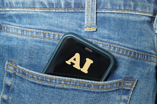 Smartphone with ai text in jeans pocket