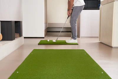 Person mid-swing indoors