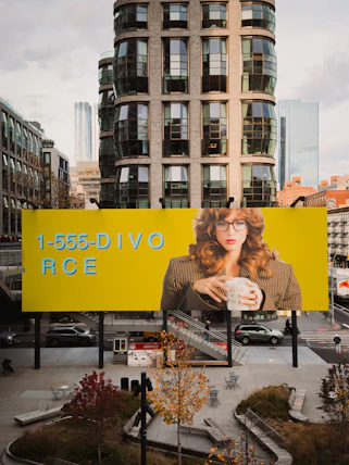 Billboard with woman holding mug and phone number