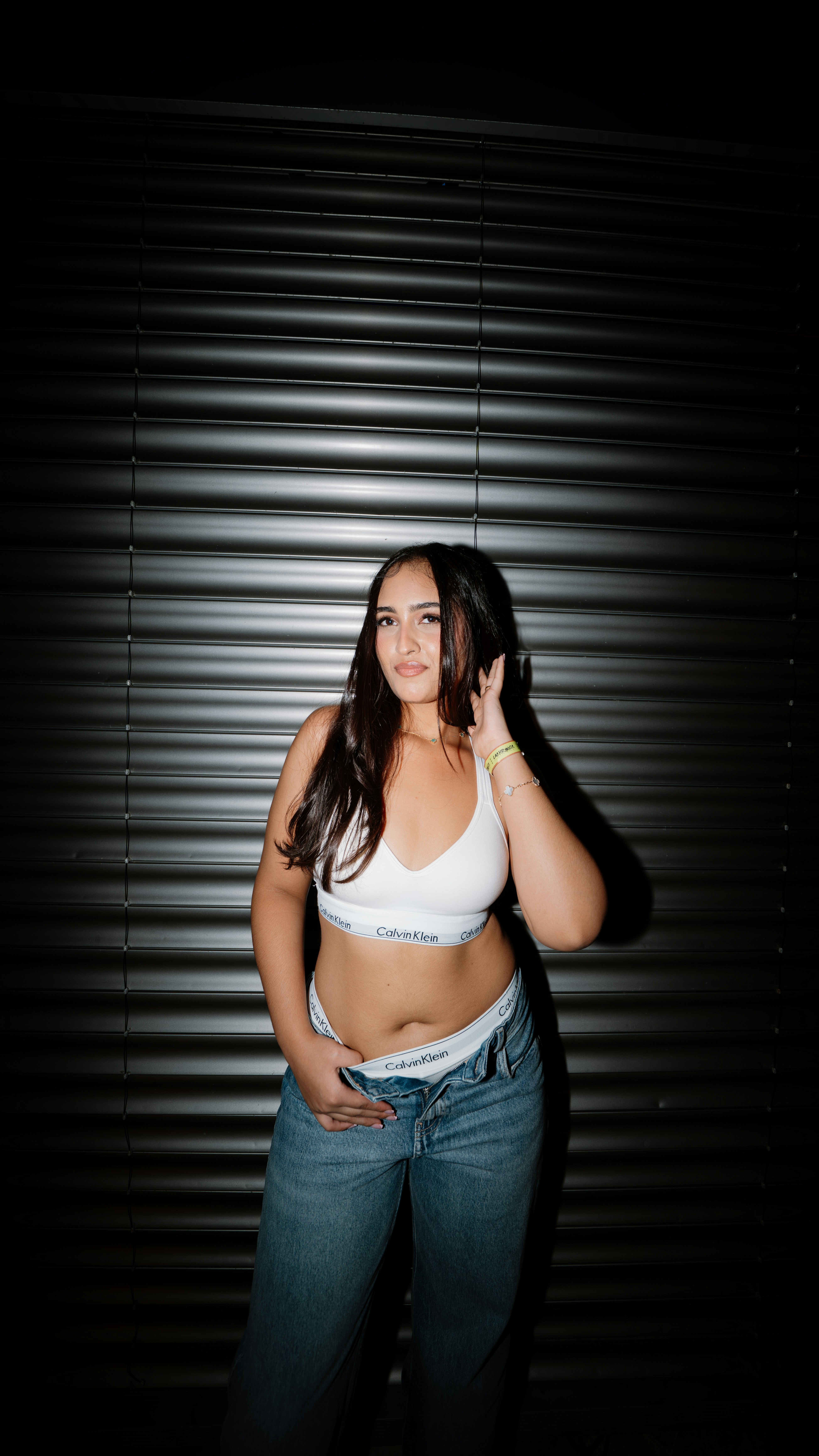 Woman confidently showcasing her authentic personal style, radiating self-assurance