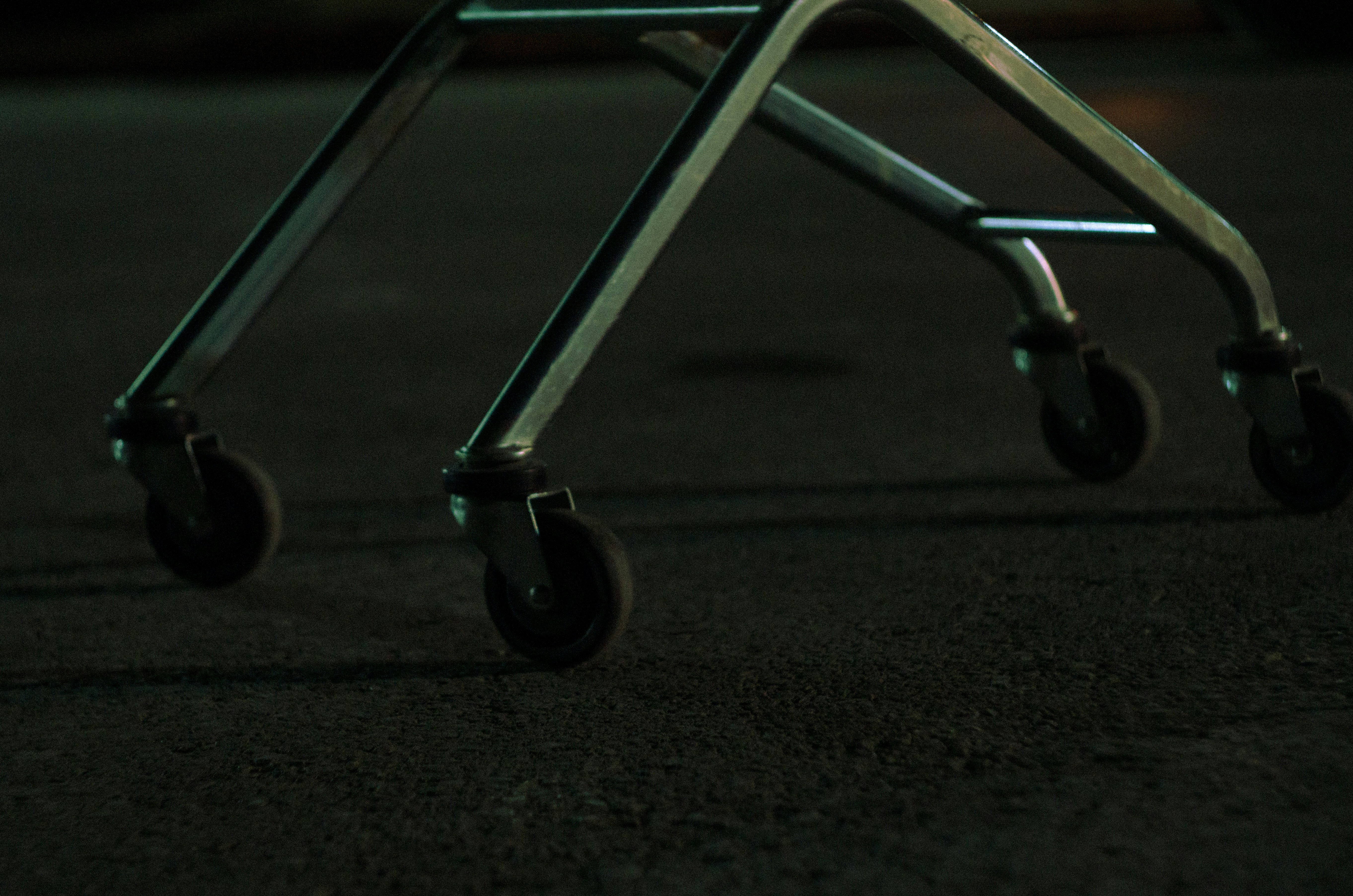 Close-up of a metal cart with four wheels