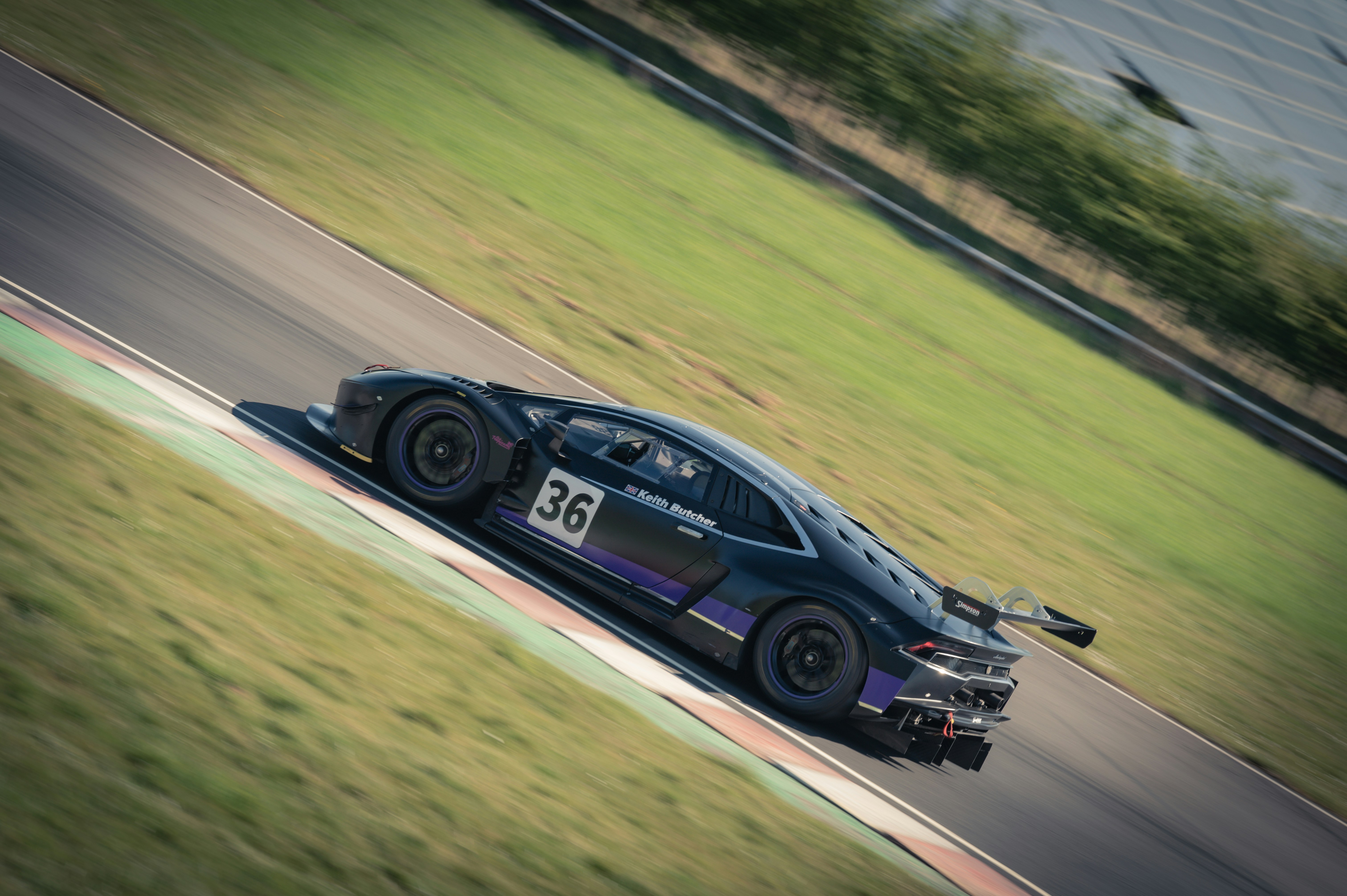 Race car with number 36 on track