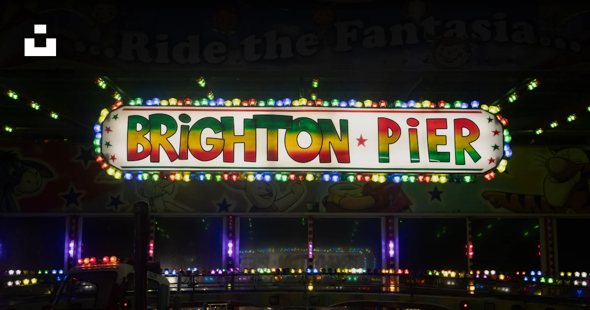 Brighton Sign Brighton pier sign illuminated with colorful lights at night photo ...