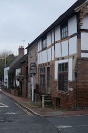 Tudor style building with brick and timber framing.