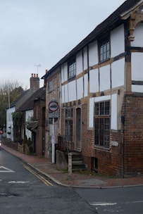 Tudor style building with brick and timber framing.