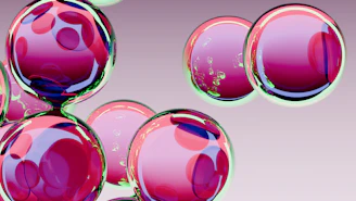 Several pink glass spheres with reflections float.