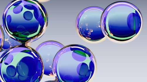 Abstract blue spheres with reflections on gray background.
