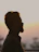 Silhouette of a man with beard at sunset
