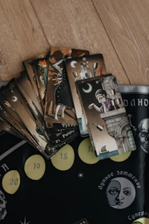 Tarot cards spread on a wooden floor