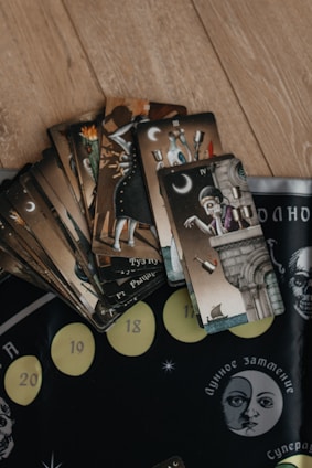 Tarot cards spread on a wooden floor