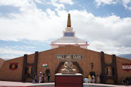 Hall of fame building with buddha statue and stupa