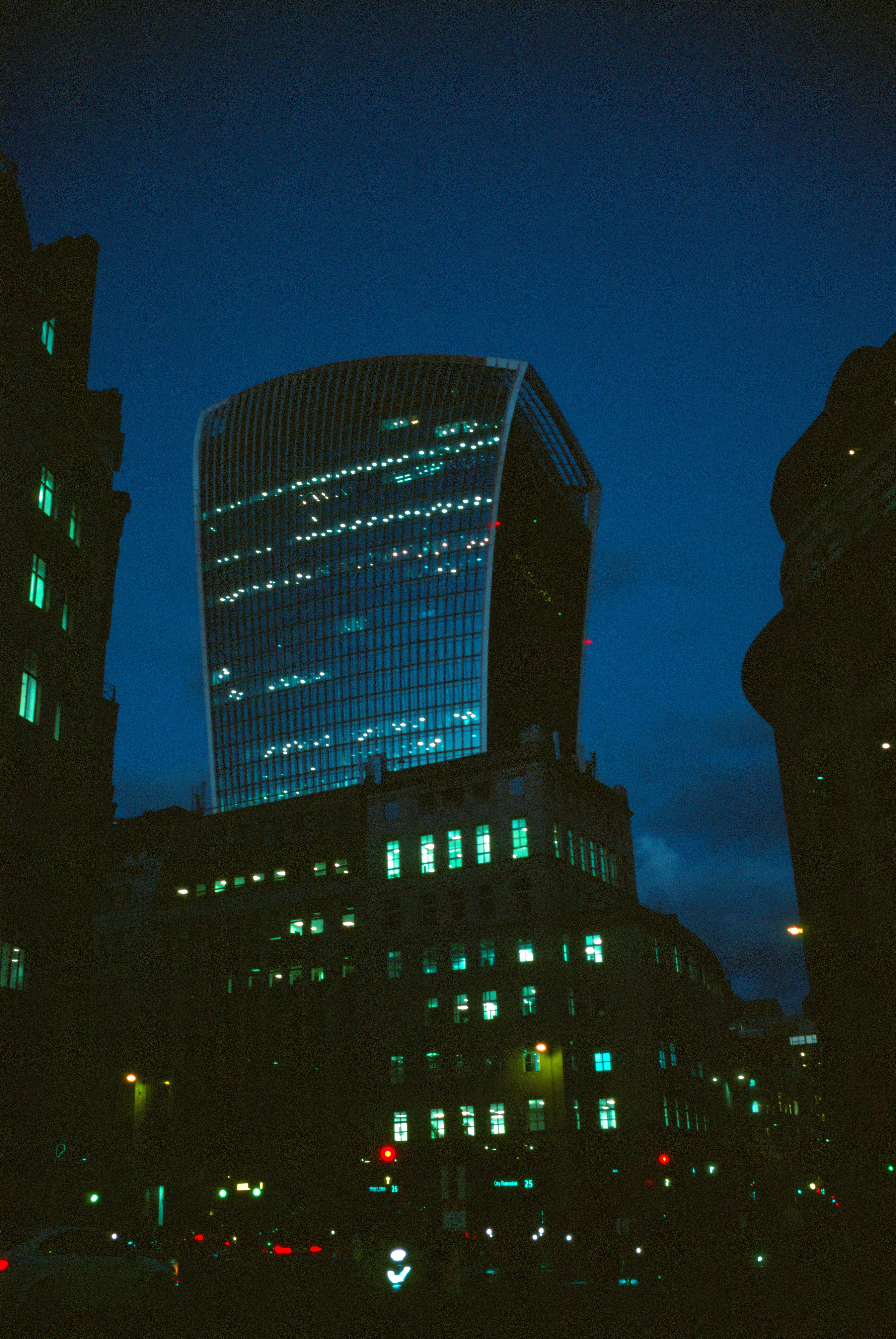 Evening glow over London's Walkie Talkie building, capturing the city's vibrant night life.