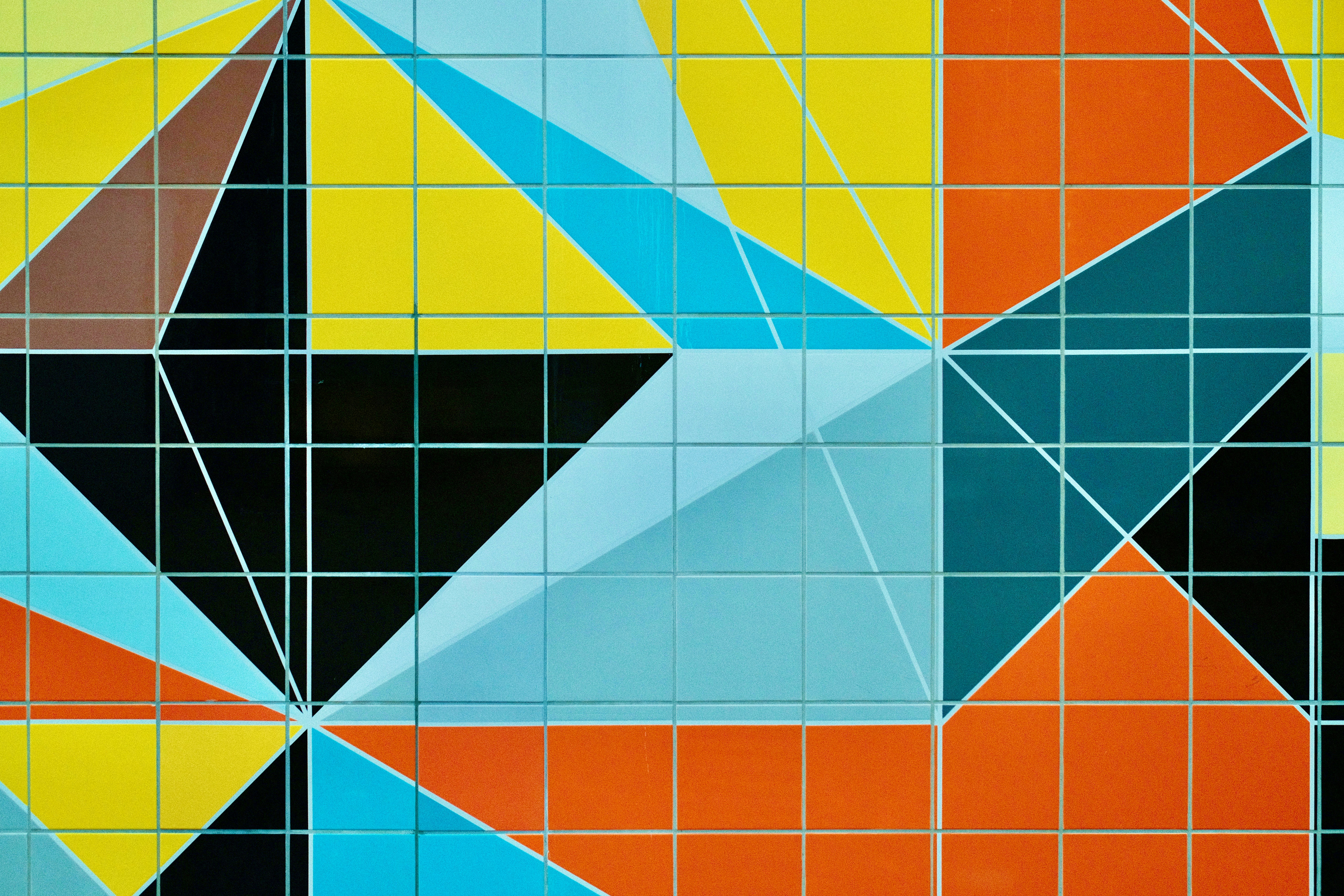 Colorful geometric pattern with triangles and squares.