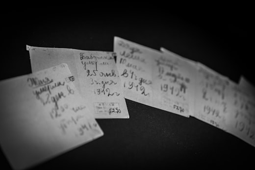 Handwritten historical records with dates and names