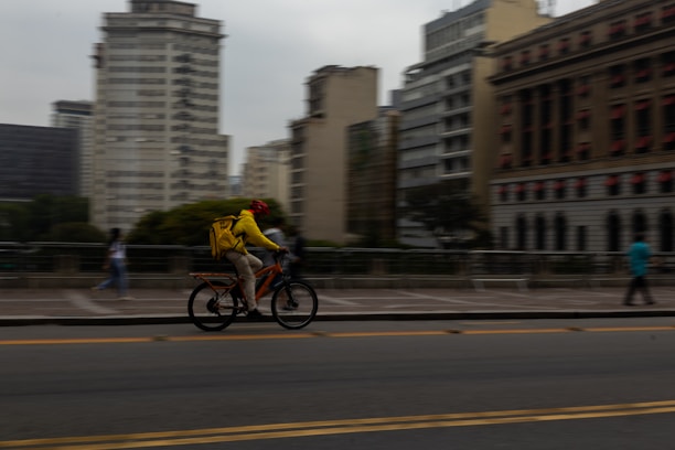 Person riding bicycle on city street