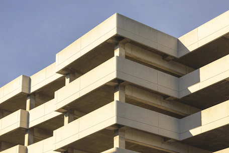 Concrete building levels against a blue sky