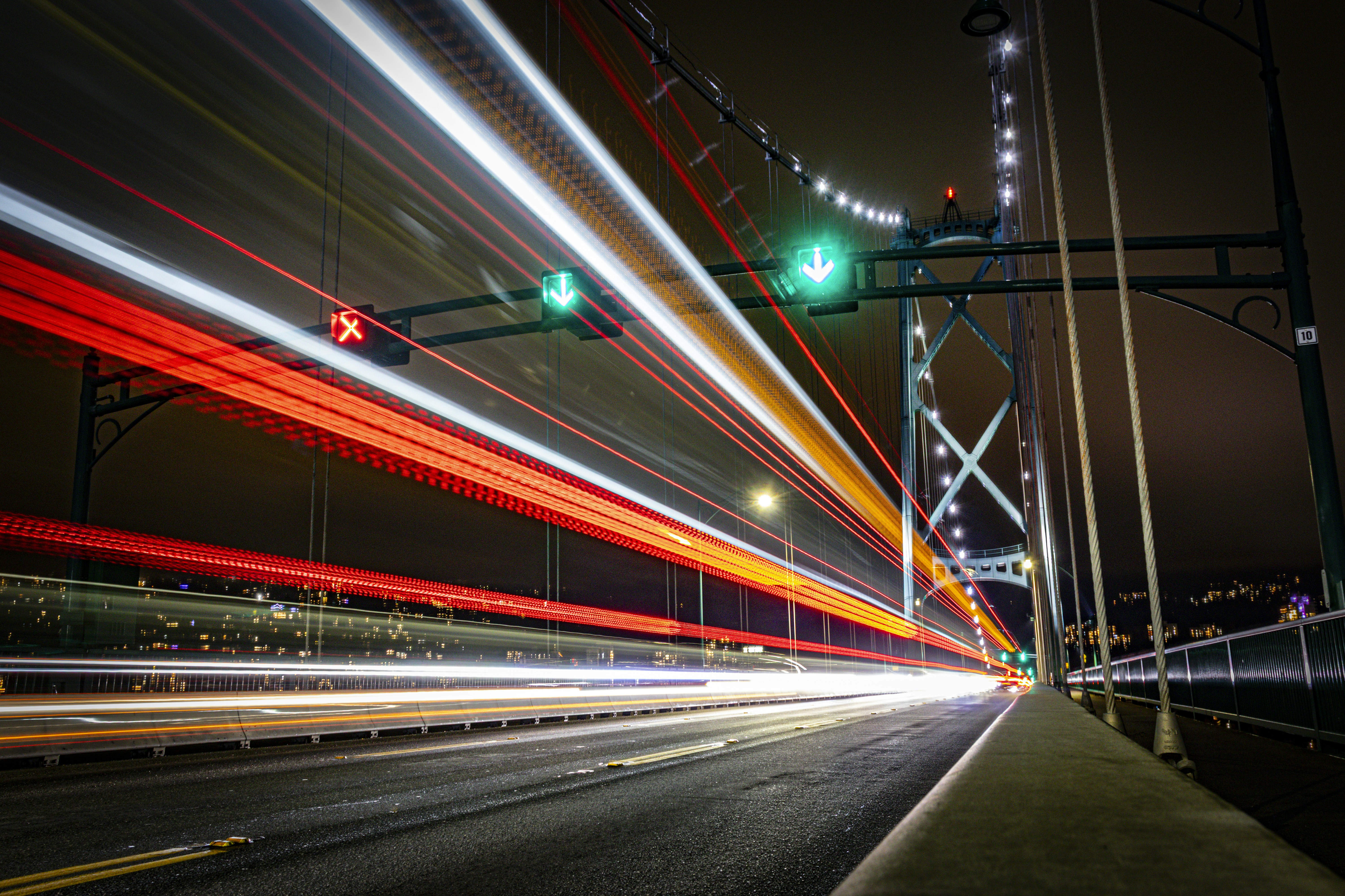 Light trails on a bridge at night