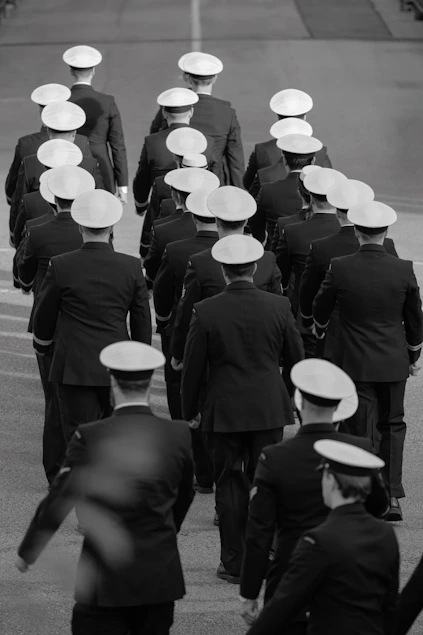 Men in uniform marching in formation