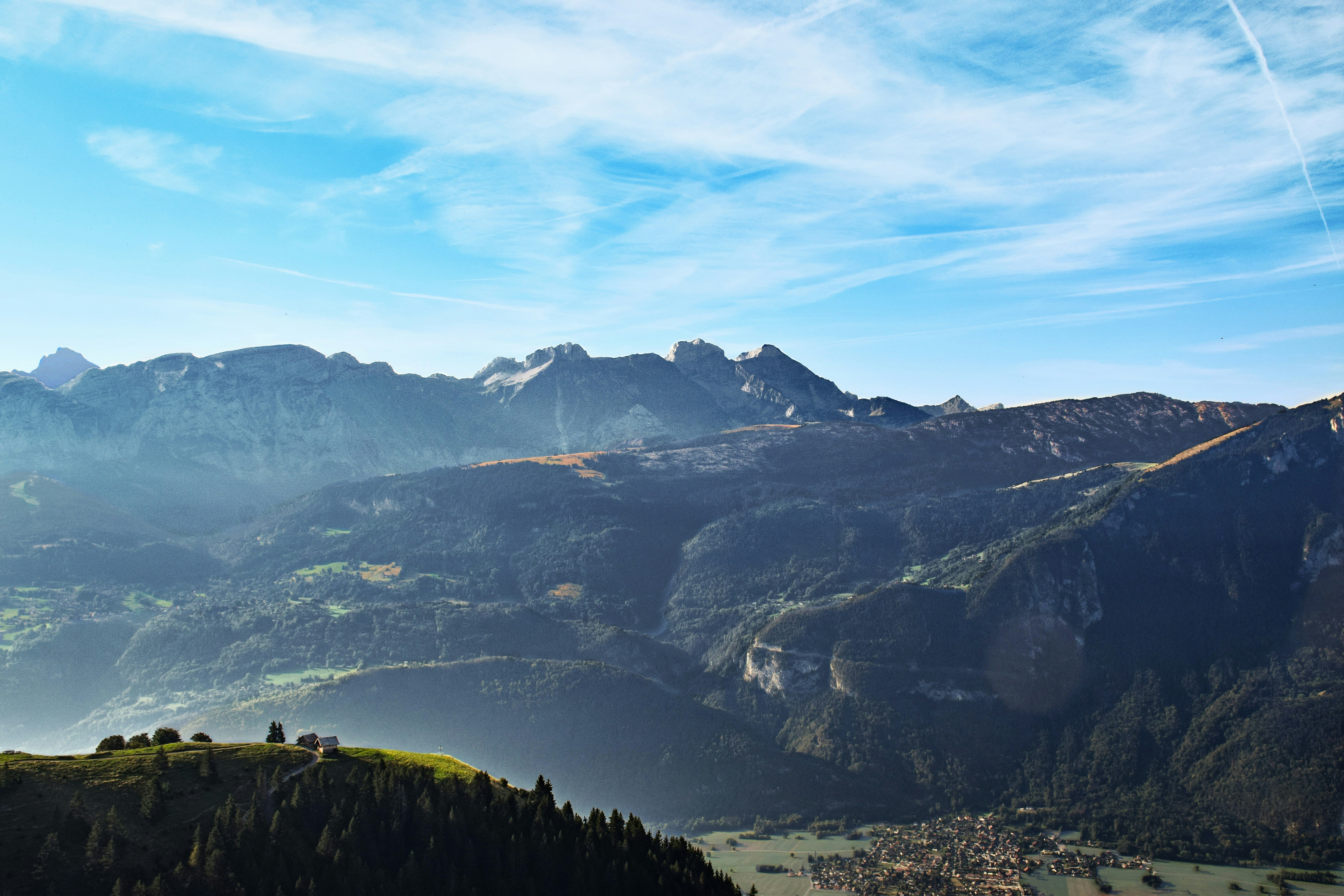 Majestic mountain range under a bright blue sky