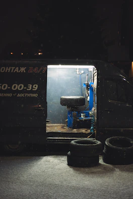 Mobile tire repair service van at night