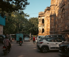 Street scene with cars and old building
