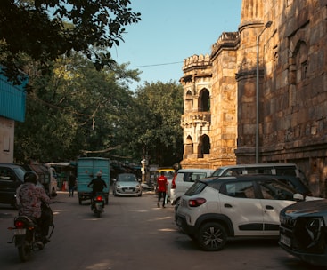 Street scene with cars and old building