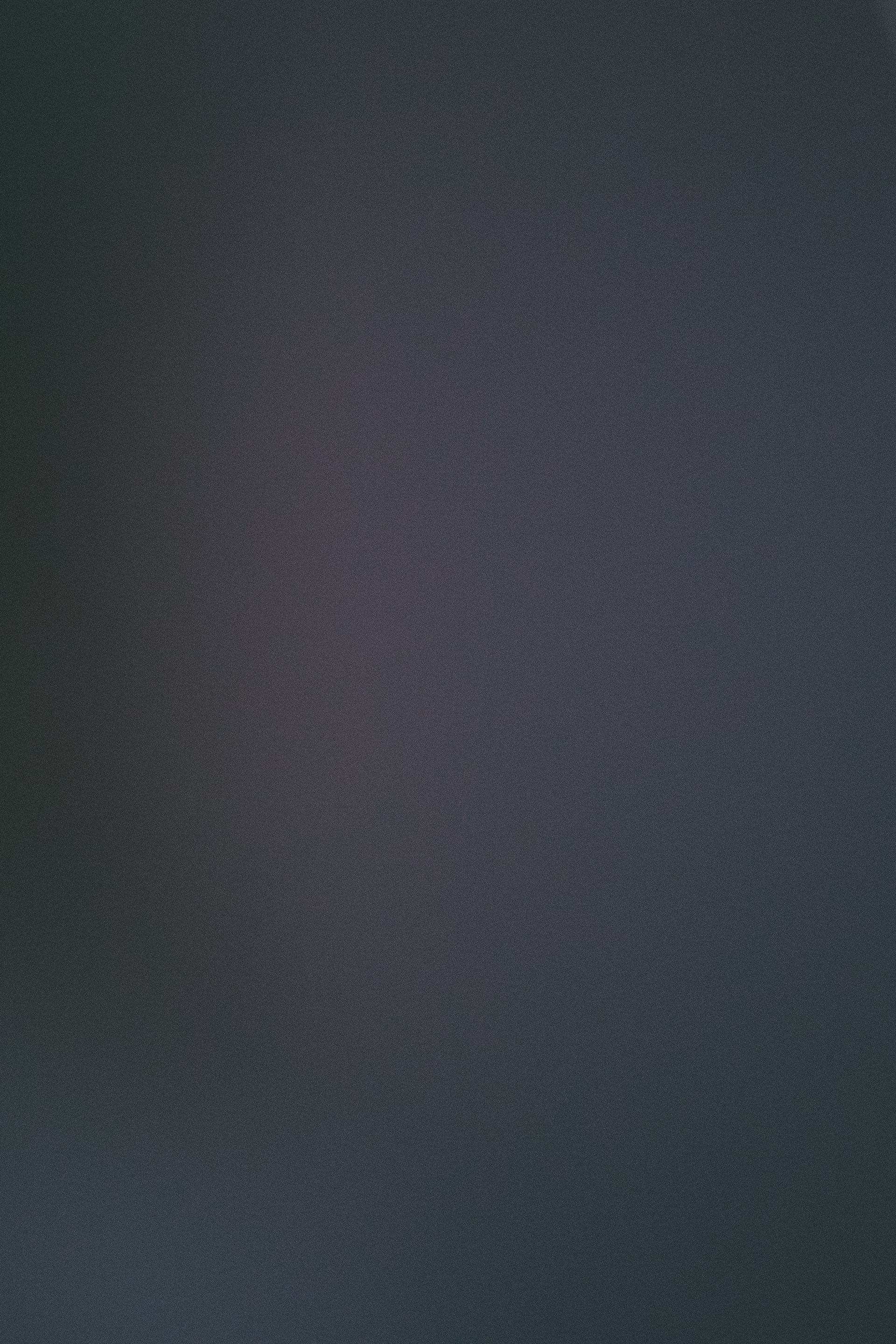 A solid dark gray background