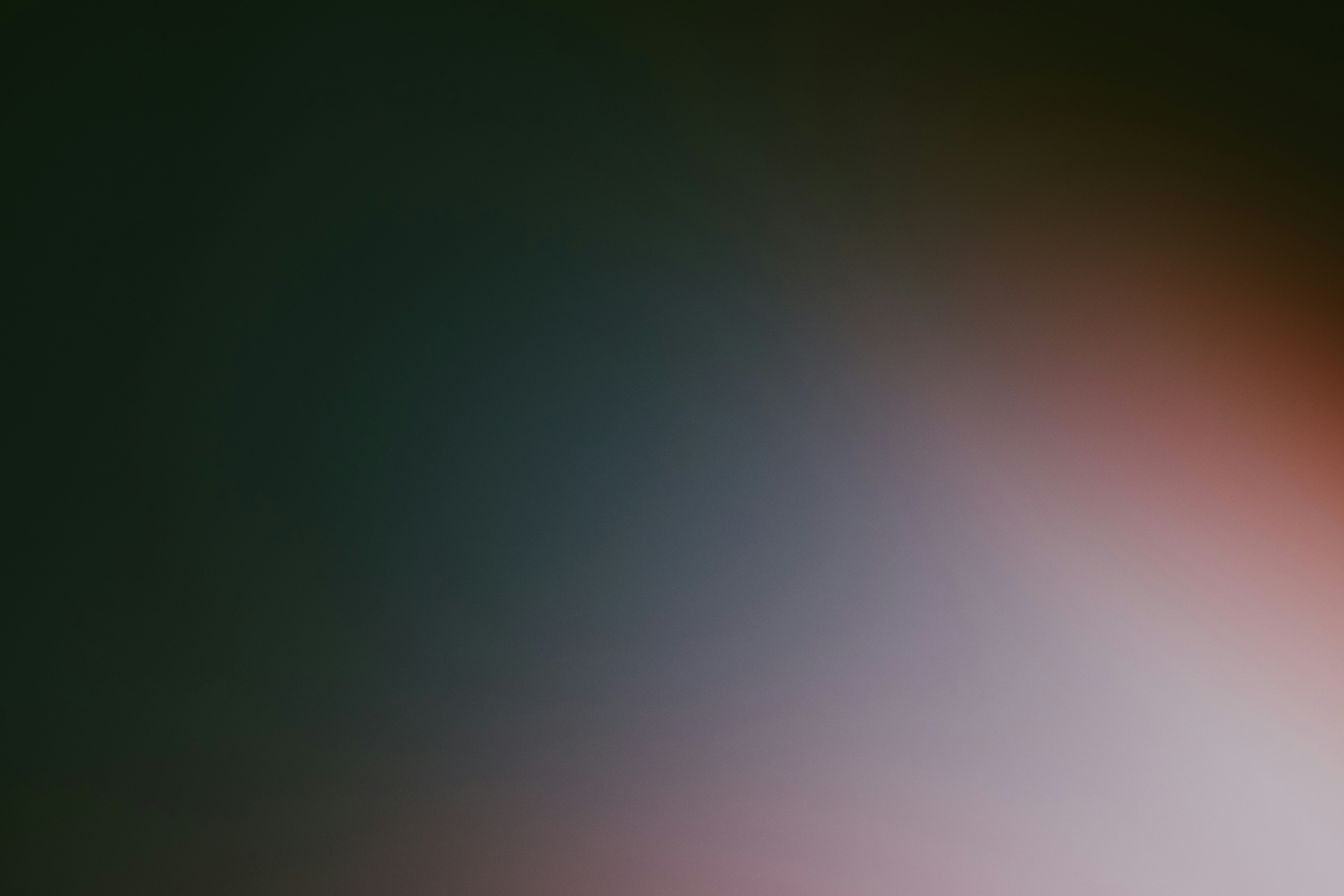 Dark background with a soft light gradient