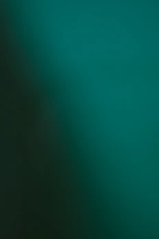 Dark teal and green gradient background