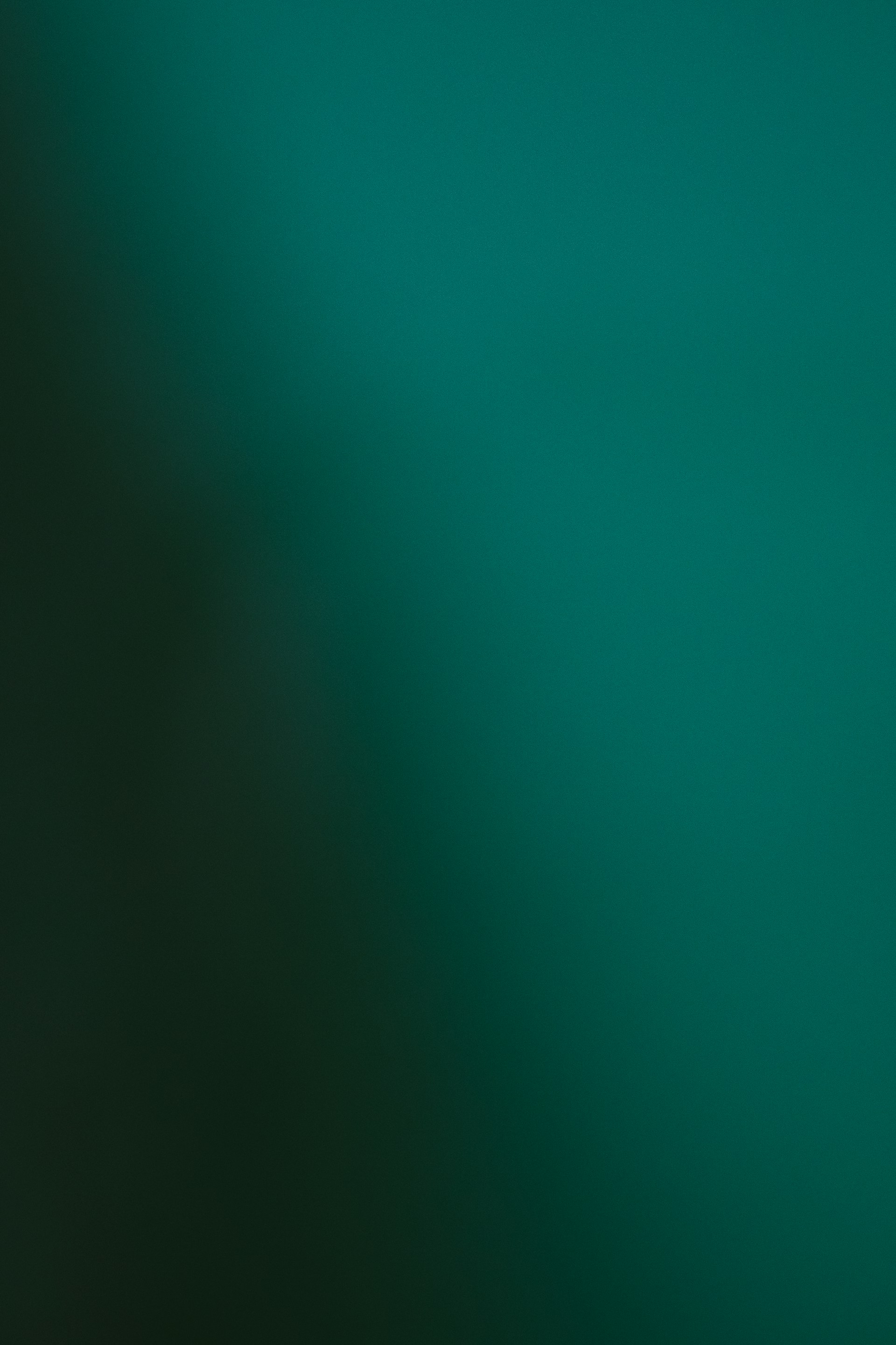 Dark teal and green gradient background