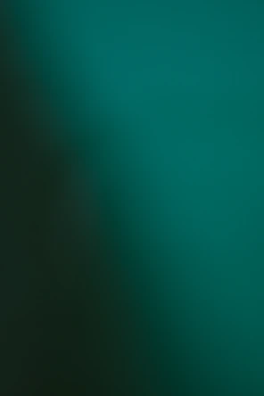 Dark teal and green gradient background