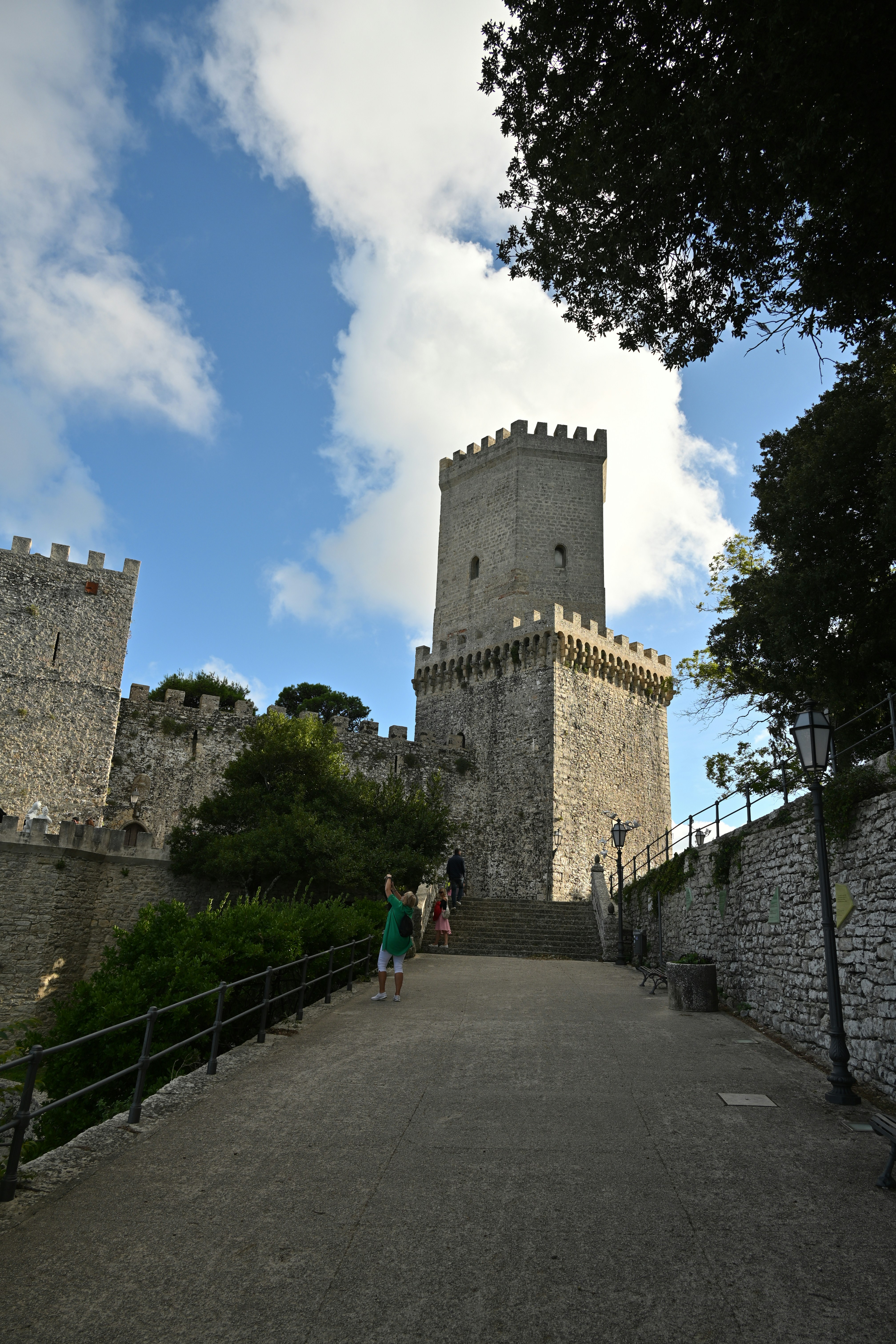 Stone castle with a tall tower and blue sky
