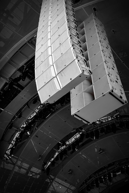 Large speaker arrays suspended from ceiling