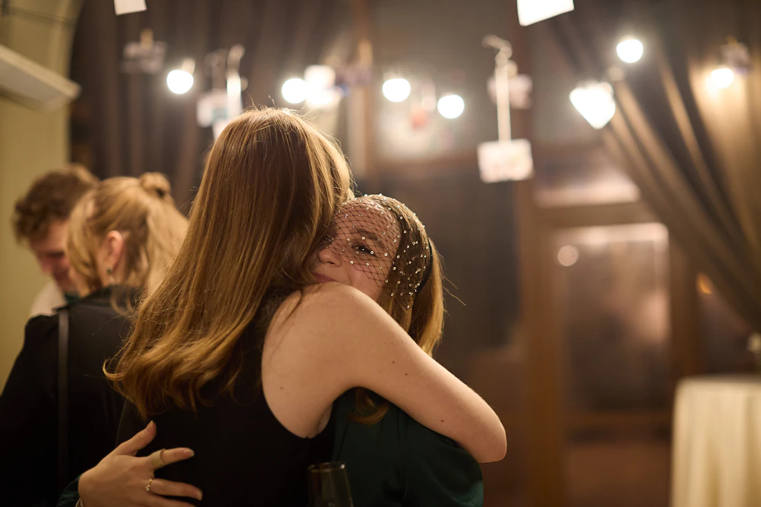 Two people sharing a warm human moment