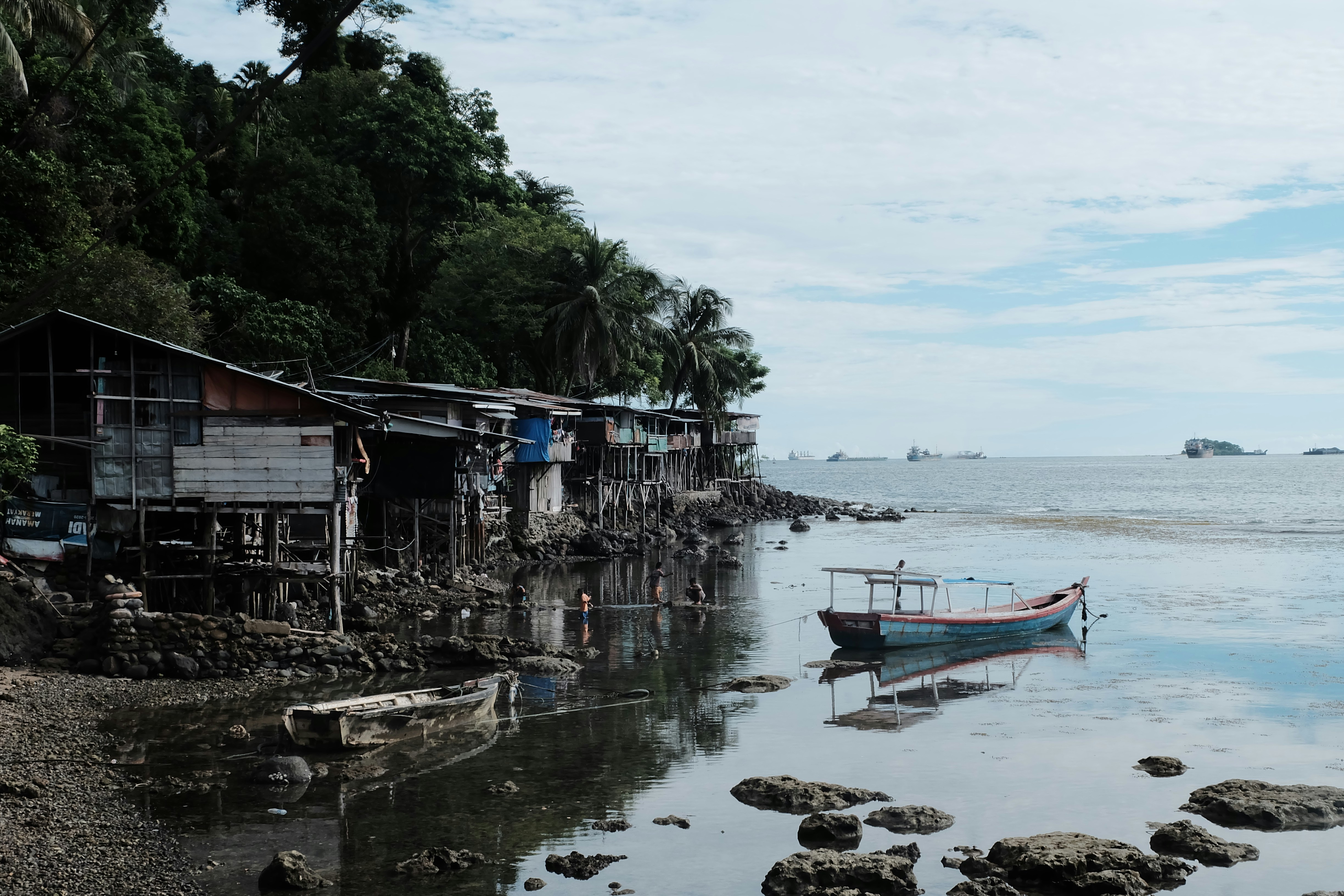 Fishing village on stilts next to the ocean