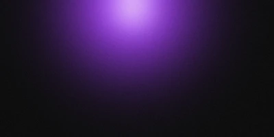 A gradient of purple fading to black