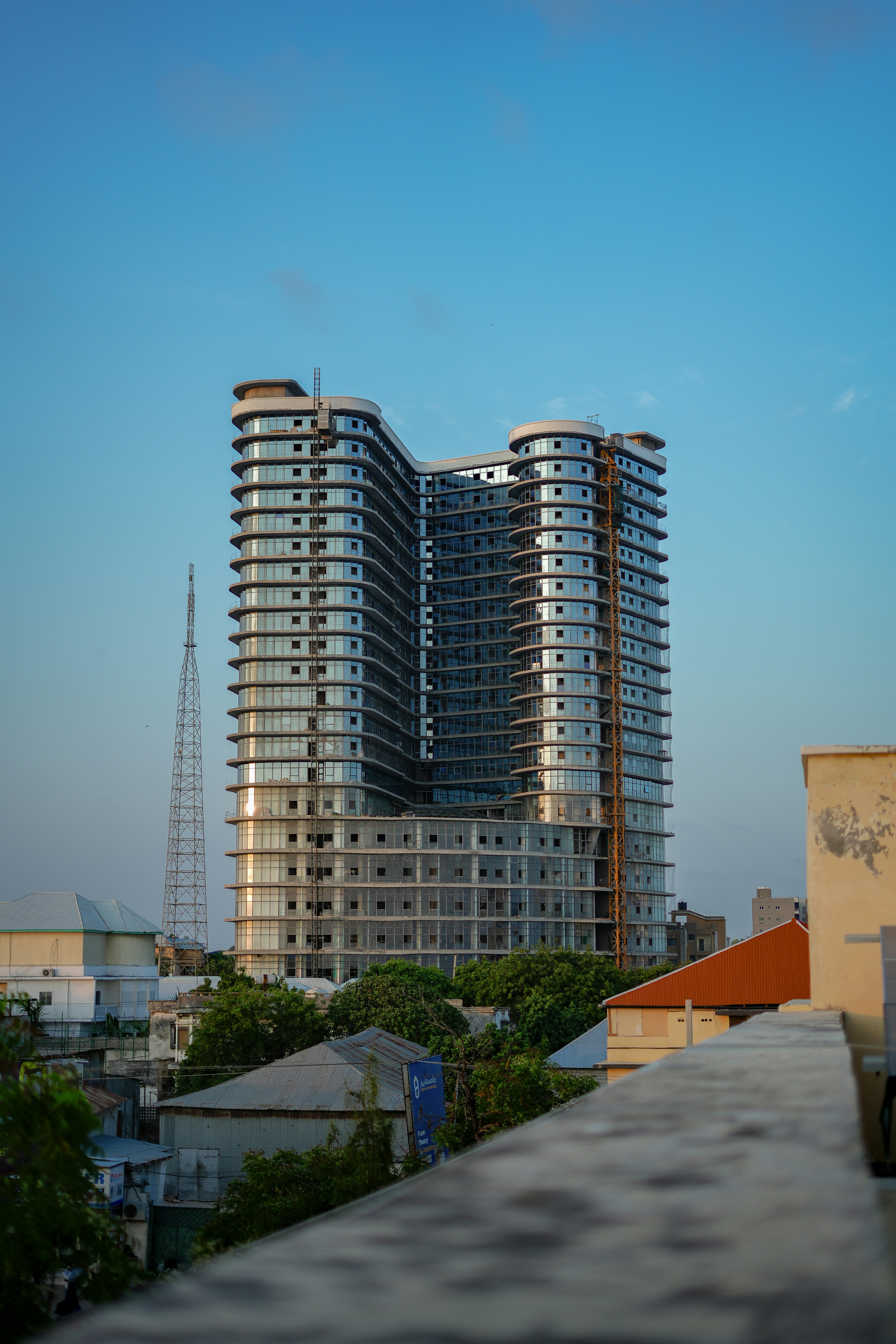 Modern skyscraper against a clear blue sky