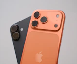 Two smartphones with distinctive camera lenses.