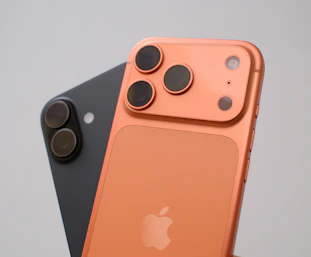 Two smartphones with distinctive camera lenses