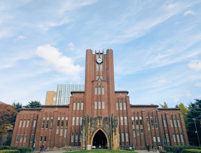 Historic brick university building with clock tower
