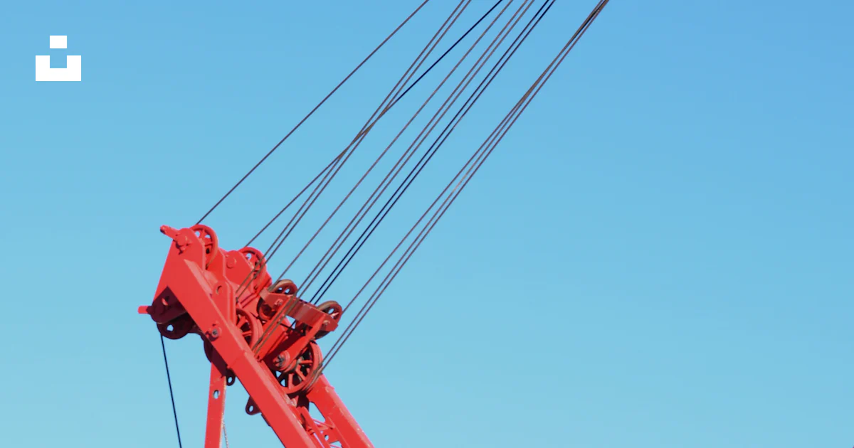 Red Crane Machine Red crane machinery against a clear blue sky photo – Free Blue sky ...