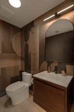 Modern bathroom with patterned wood accent wall