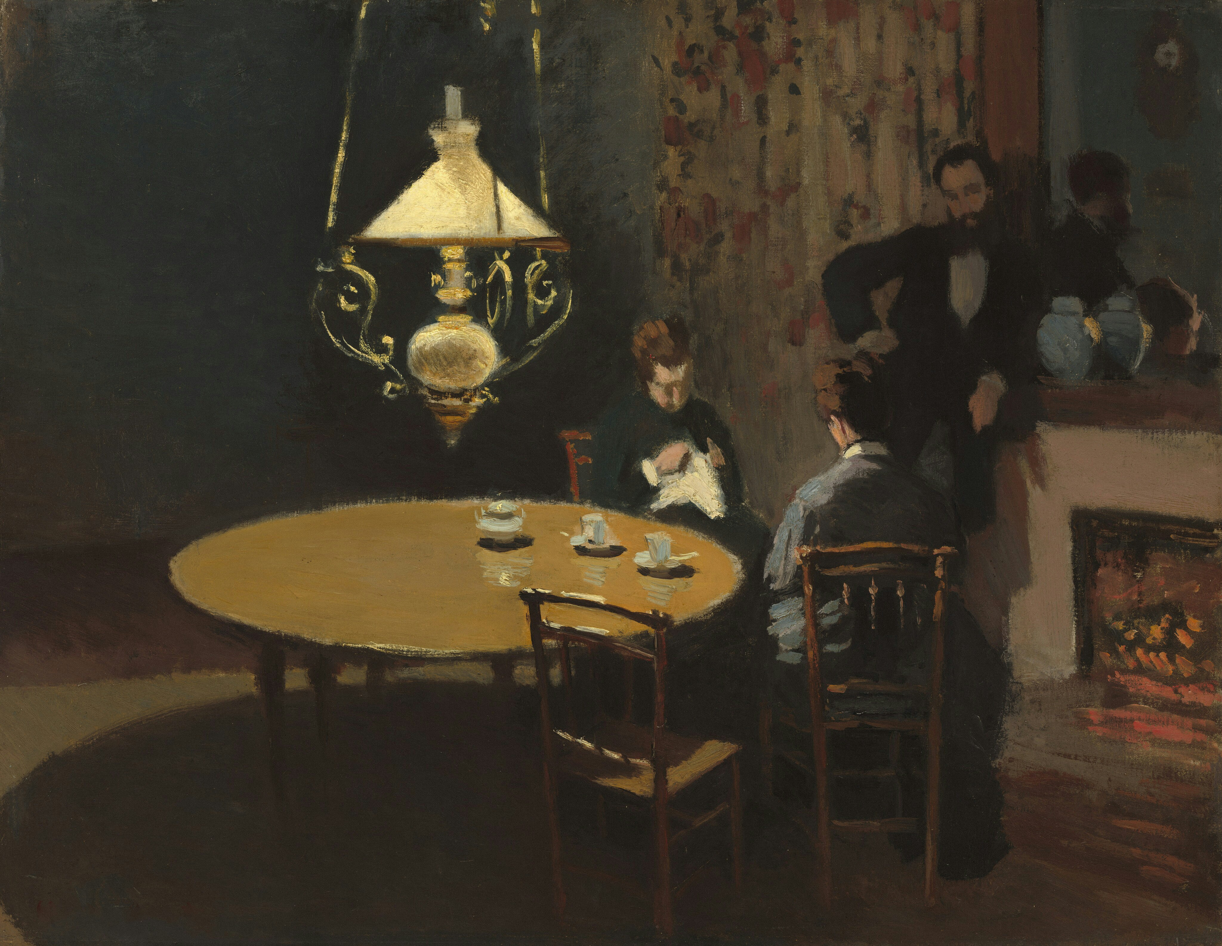 A family sitting around a dining table, but the young adult at one end looks withdrawn and disconnected from the smiling parents, highlighting a communication gap.