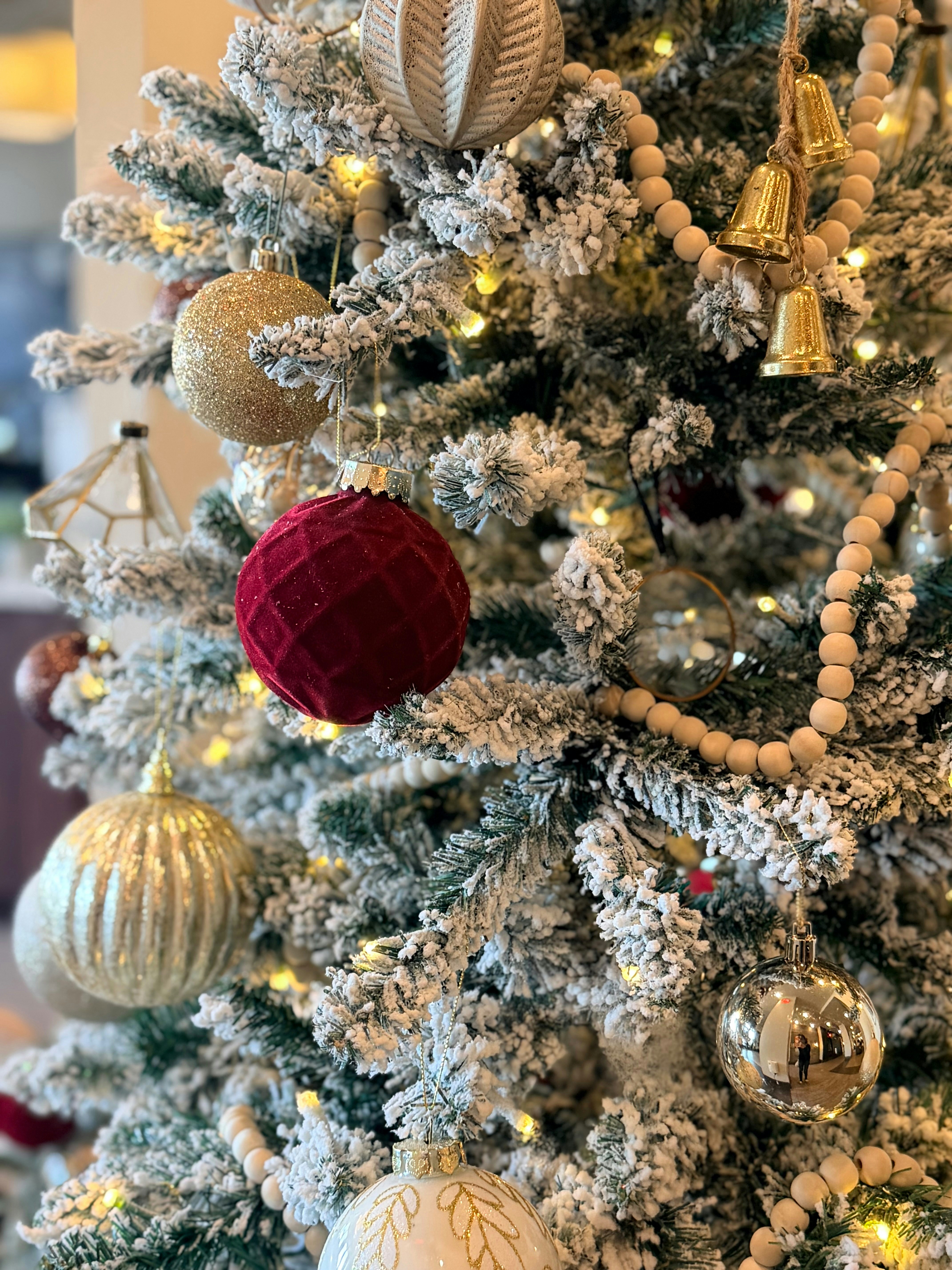 A decorated christmas tree with ornaments and lights
