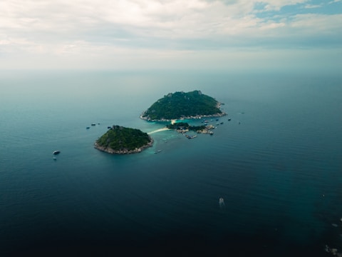 Two tropical islands in a vast blue ocean