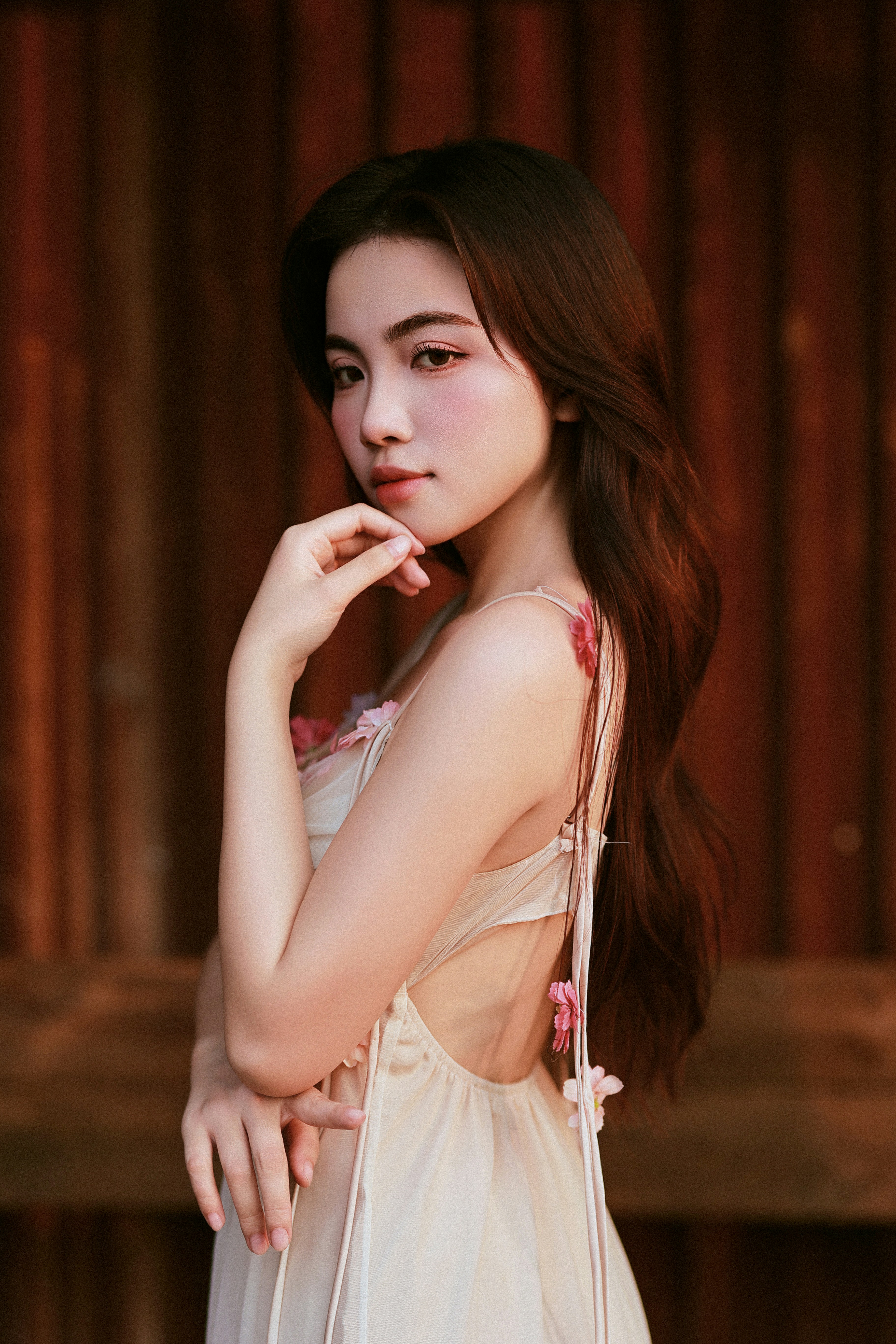 Soft, romantic portrait with smooth luminous skin and understated makeup