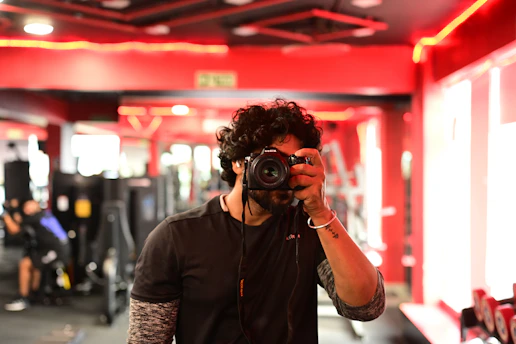 Man taking selfie in a gym