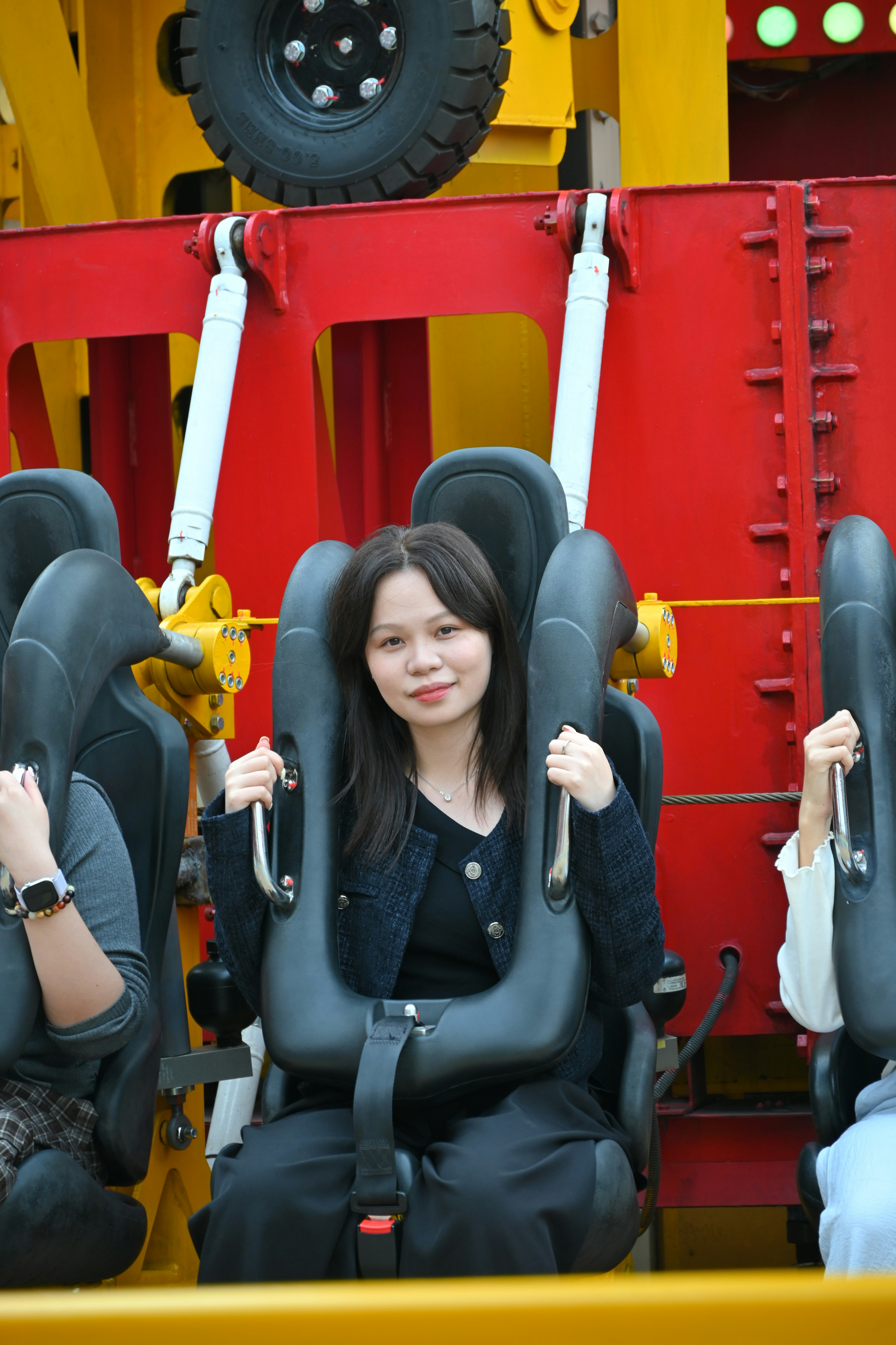 Young woman on amusement park ride