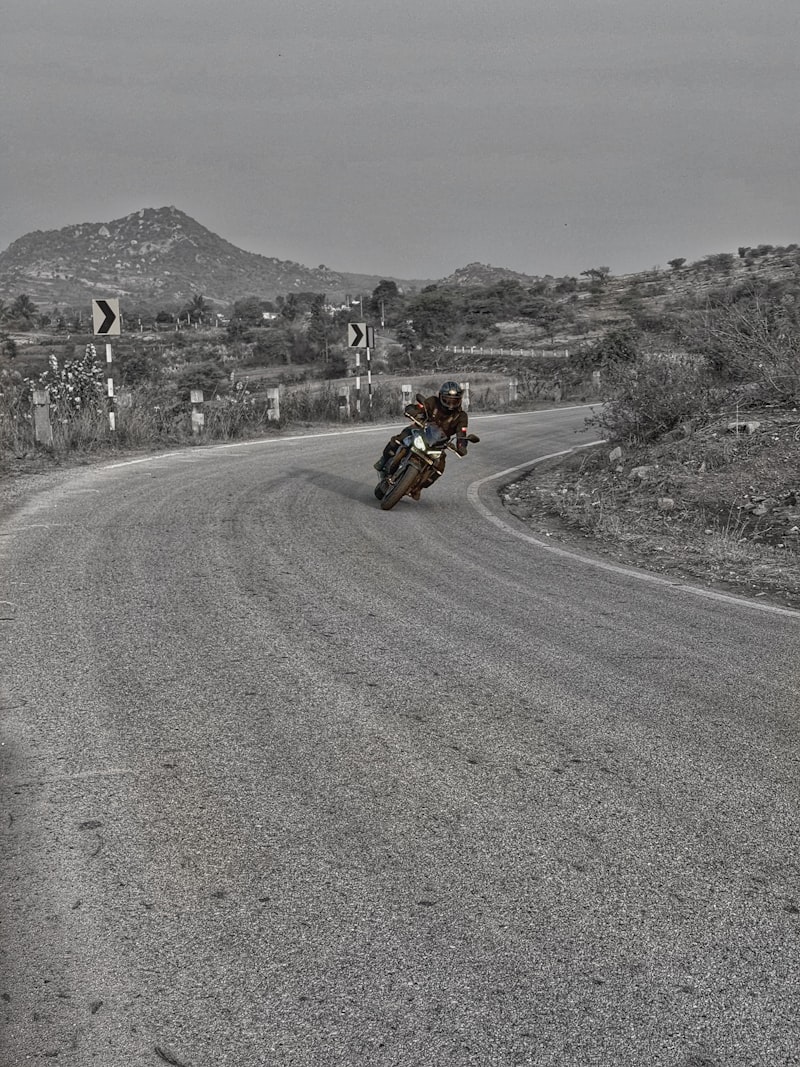 Rider on a scenic winding road