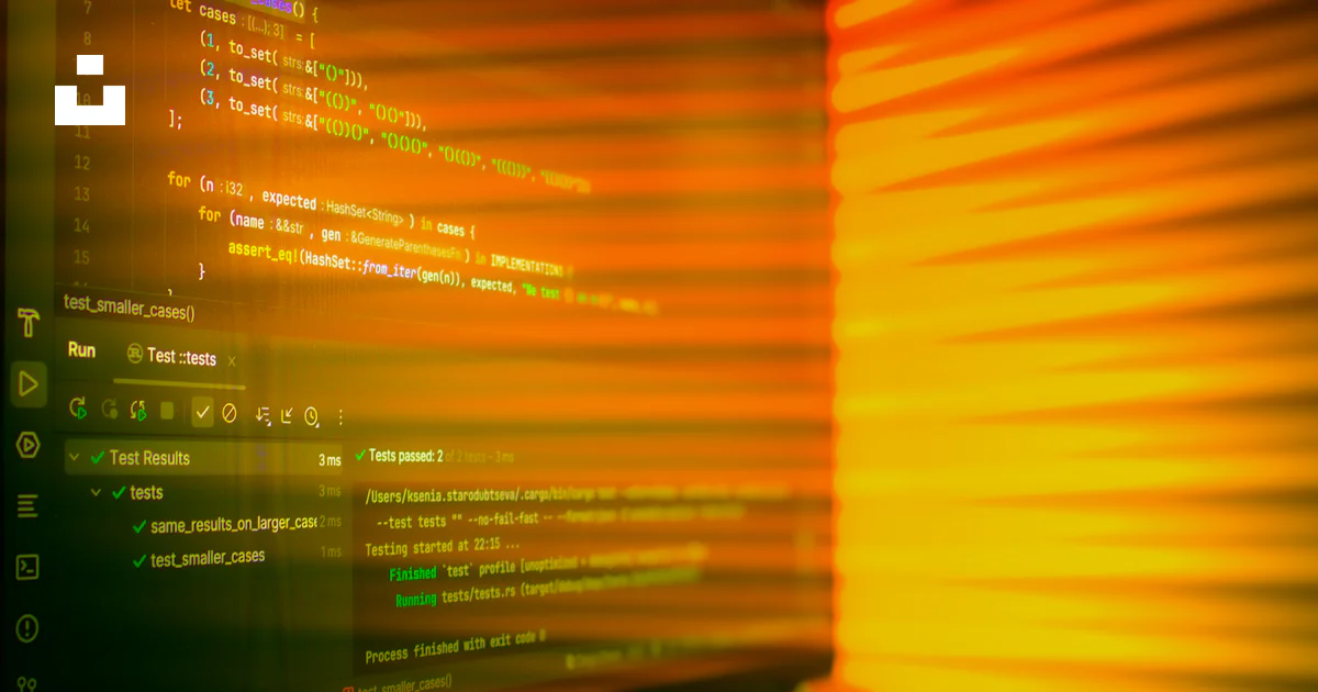 Laptop screen displaying code with orange glow. photo – Free Technology ...